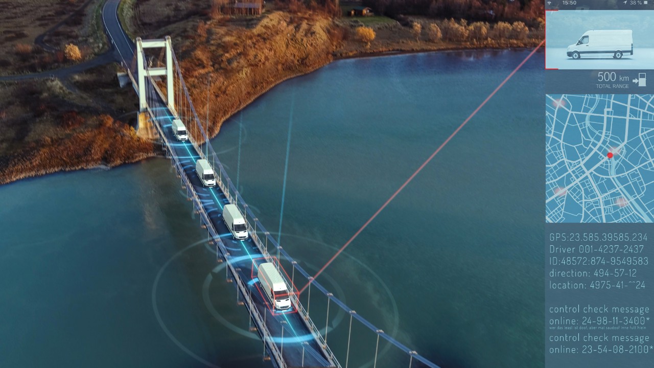 White vans crossing a suspension bridge, overlayed with digital information about the vehicles