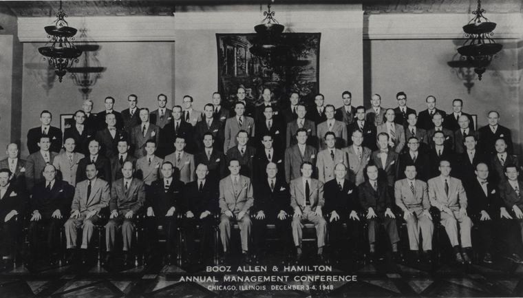 Group portrait of men in suits at the Booz Allen management conference in 1948